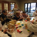 Residents making ginger bread house at Christmas