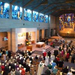 The congregation gathers for a festive celebration in Our Lady Queen of Peace Chapel.