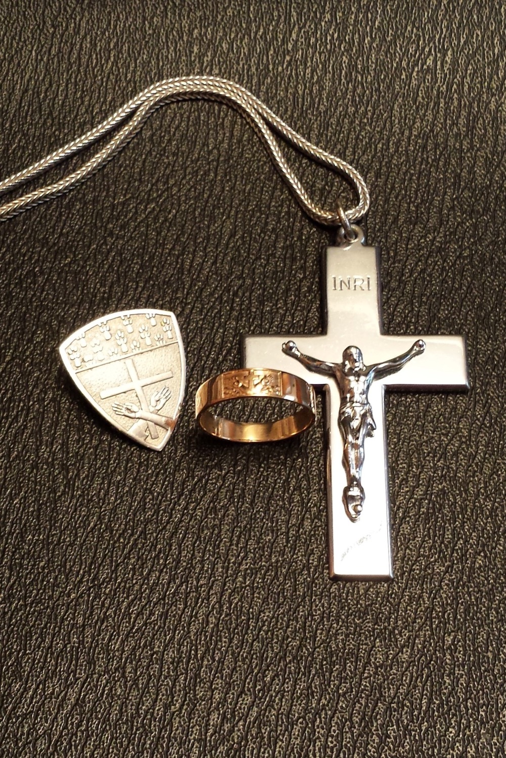 All of our Sisters wear the community ring and the community crucifix or emblem as signs of membership in our Congregation.
