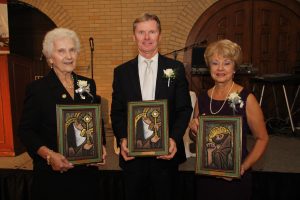 Franciscan Awards were given to three people at the Gala. Peggy Rabideau, left, and Fred Brower received the St. Clare Award and Dee Resnick the St. Francis Award.