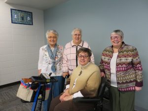 From left, Vincenz Meyer and Sister Maria Goretti Sodd, co-directors of the Associates program prior to Sister Roselynn taking over in 2011, Sister Karen Zielinski (seated), who became the co-director of the program on December 1, and Sister Roselynn.