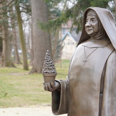 A sculpture of our Foundress Mother Mary Adelaide is located in front of the Portiuncula.